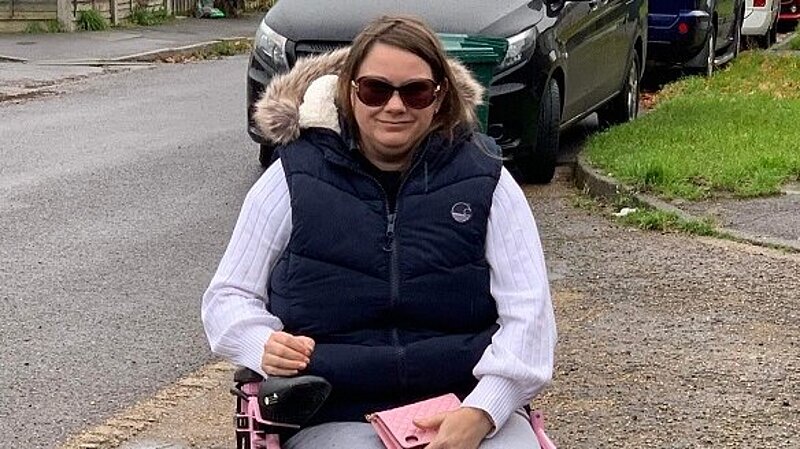 Victoria using her wheelchair on the improved pavement
