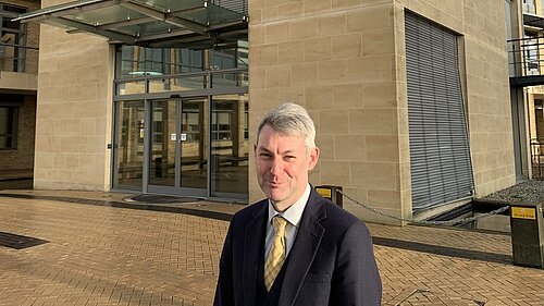Will Forster outside Woodhatch Place