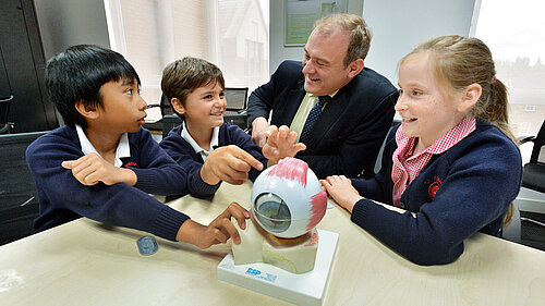 Ed Davey with three school chilcren